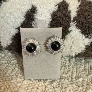 Never worn. Sunburst style with cubic zirconia. Real black freshwater dyed pearl